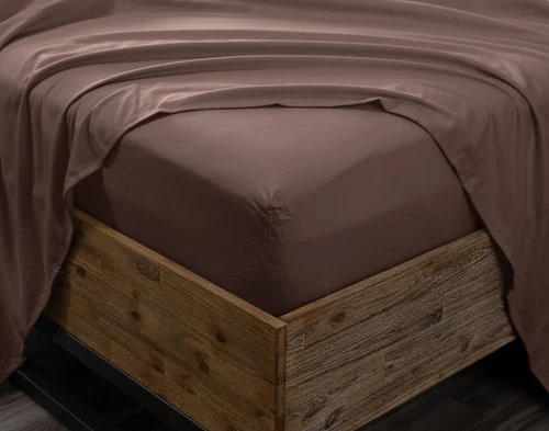 Angled view of the corner on a mattress wrapped in our Rustic Woods Flannel Sheet Set.