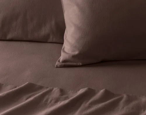 Close-up on the corner of a pillowcase from our Rustic Woods Flannel Sheet Set.