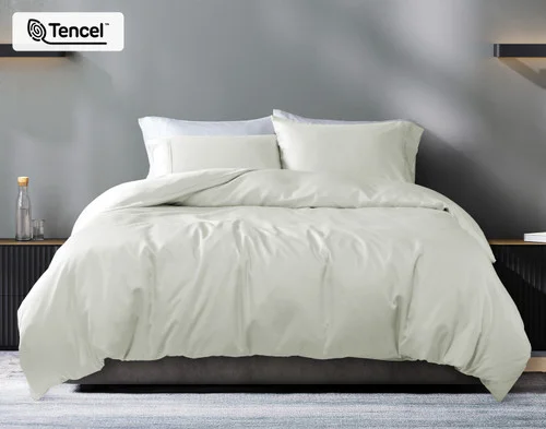 Front view of our Oyster Eucalyptus Luxe Duvet Cover dressed over a plain queen bed.