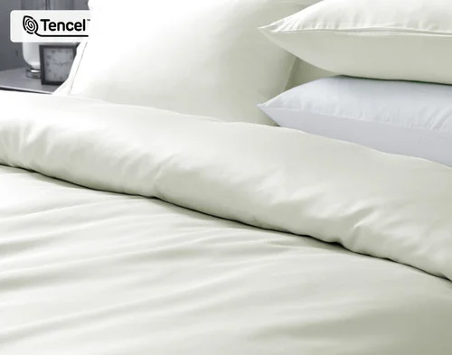 Angled view of a folded edge on our Oyster Eucalyptus Luxe Duvet Cover.