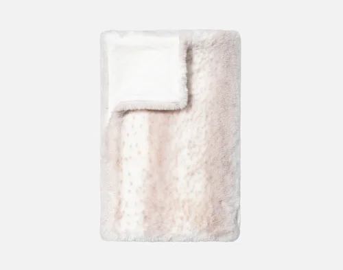 Our Animal Faux Fur Throw - Snow Leopard folded into a rectangle against a white background.