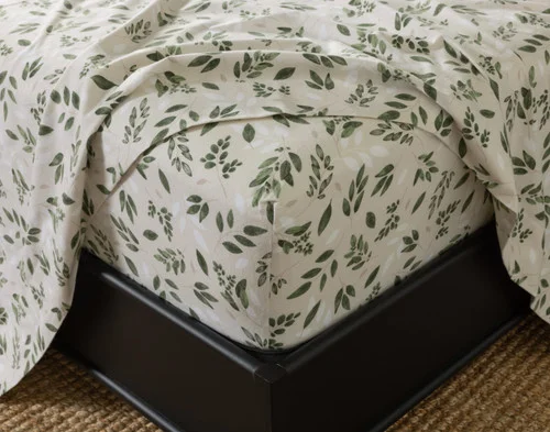 Close-up of the fitted sheet from our Woodmere Organic Cotton Flannel Sheet Set fitted over a mattress.