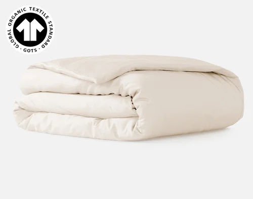 Our Undyed & Unbleached Organic Cotton Duvet Cover folded into a tidy square.