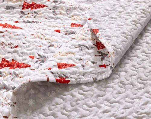 Close-up on a folded corner from our Merryvale Coverlet Set.