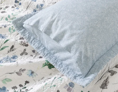 Reverse view of the envelope enclosure on a pillow sham from our Linnea Cotton Quilt Set.
