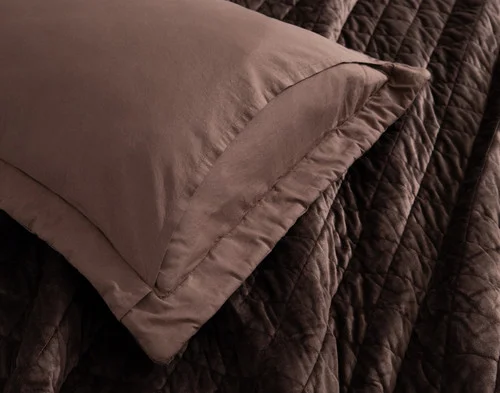 The reverse side of our Jasper Pillow Sham atop our Jasper Duvet Cover.