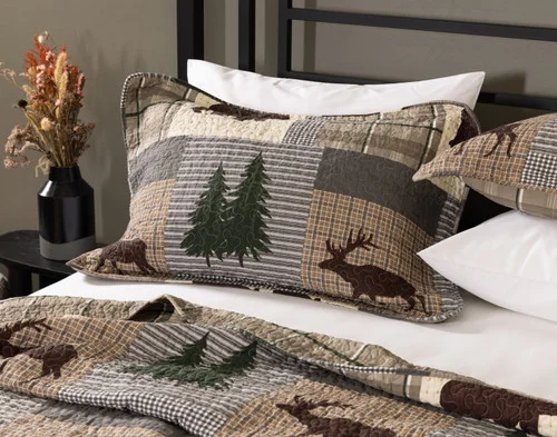 Our Pineridge Cotton Quilt Set dressing the head of a bed.