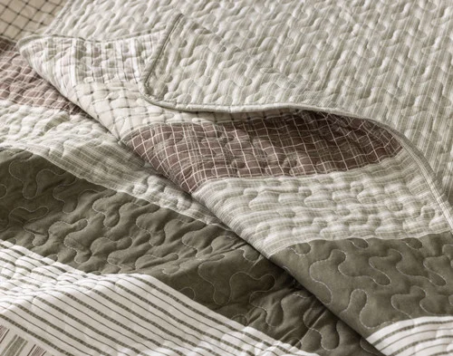 Close-up on a folded corner from our Stratton Coverlet Set.