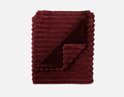 Our Channel Plush Throw - Mulled Wine folded into a rectangle against a white background.