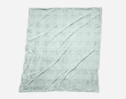 Our Etched Check Throw - Silver Sage lying on a white background.