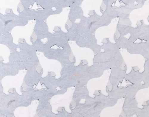 Close-up of a flat surface on our Polar Cove Glow in the Dark Throw.