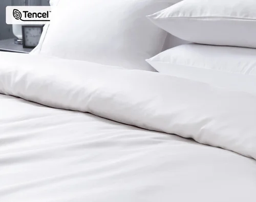 Folded top edge of our Eucalyptus Luxe TENCEL™ Lyocell Duvet Cover in White to show its soft folded surface.