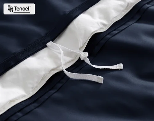 Close-up on the inner duvet ties at the edge of our Deep Space BeechBliss Duvet Cover.