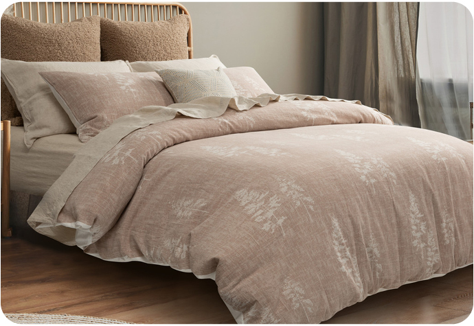 Our Elan Bedding Collection features a taupe textured design with a minimalist tree print and coordinating pillow shams
