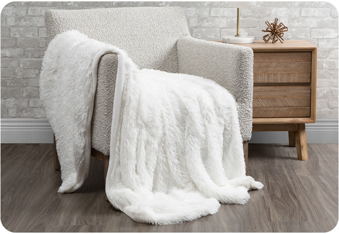 Our Frosted Shaggy Throw in Pure White features a textured finish. More colours available