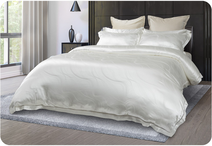 Notre housse de couette blanche Verve Silk Blend ensemble présentée sur un lit.